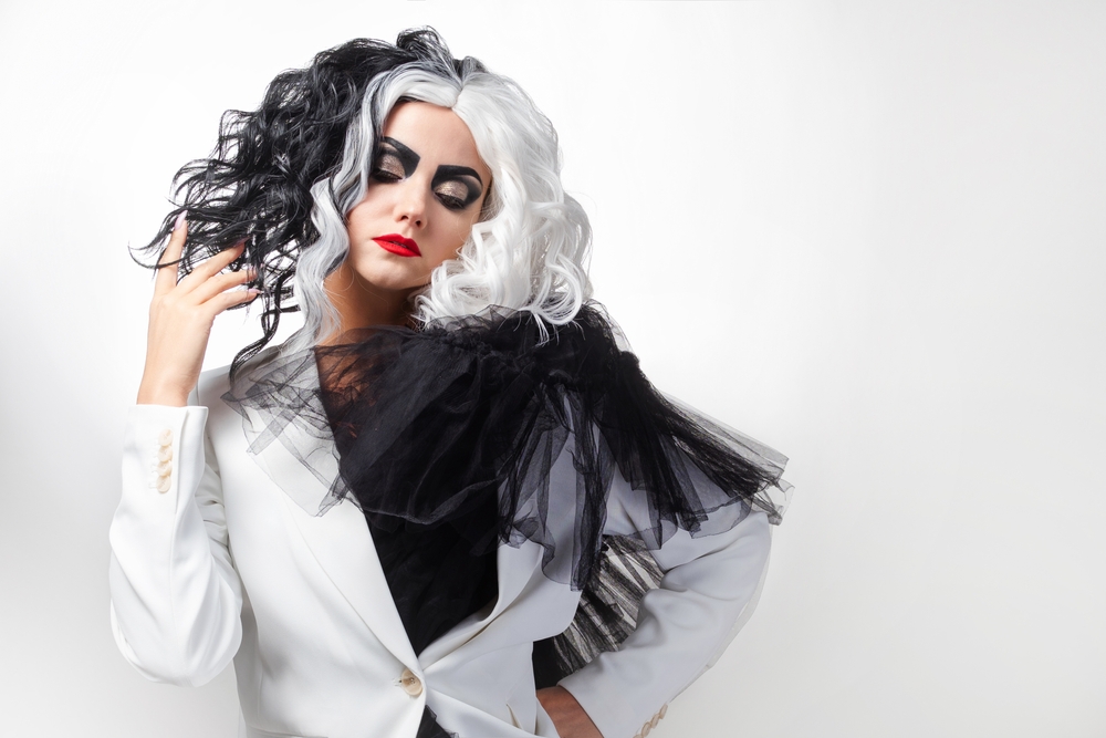 A Cruella de Vil look-alike woman representing that your brand story needs a villain